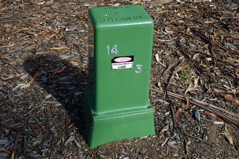 green electrical box on property|electrical transformer boxes in yard.